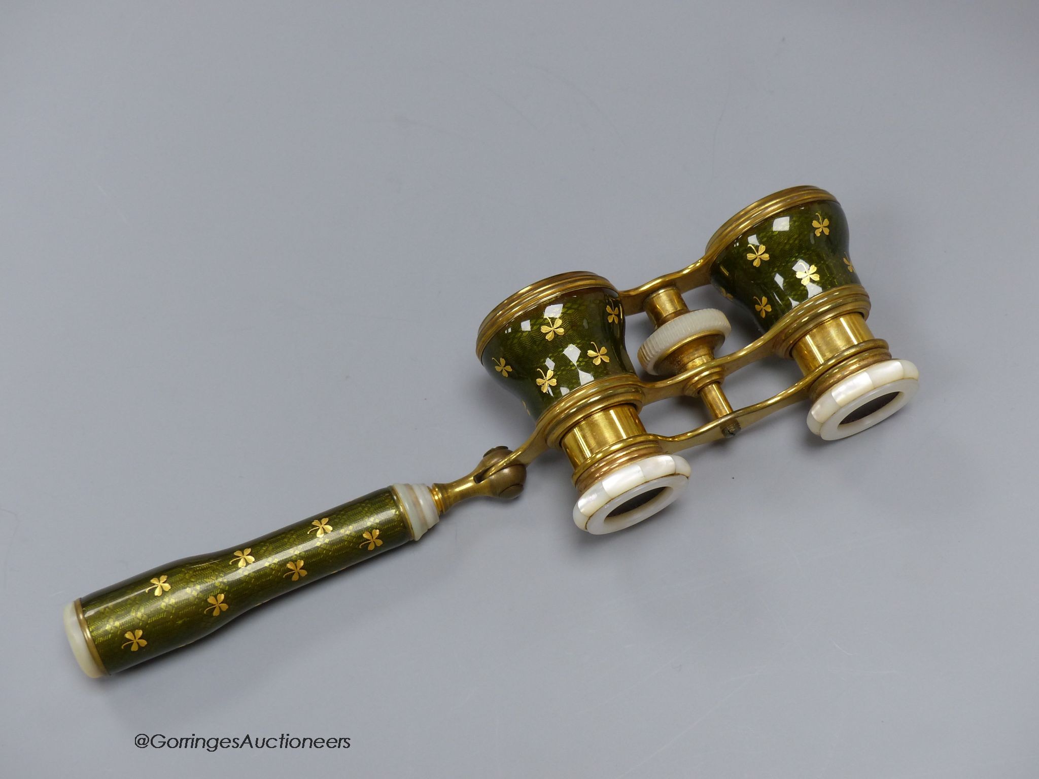 A pair of gilt brass, enamel and mother-of-pearl opera glasses, c.1900